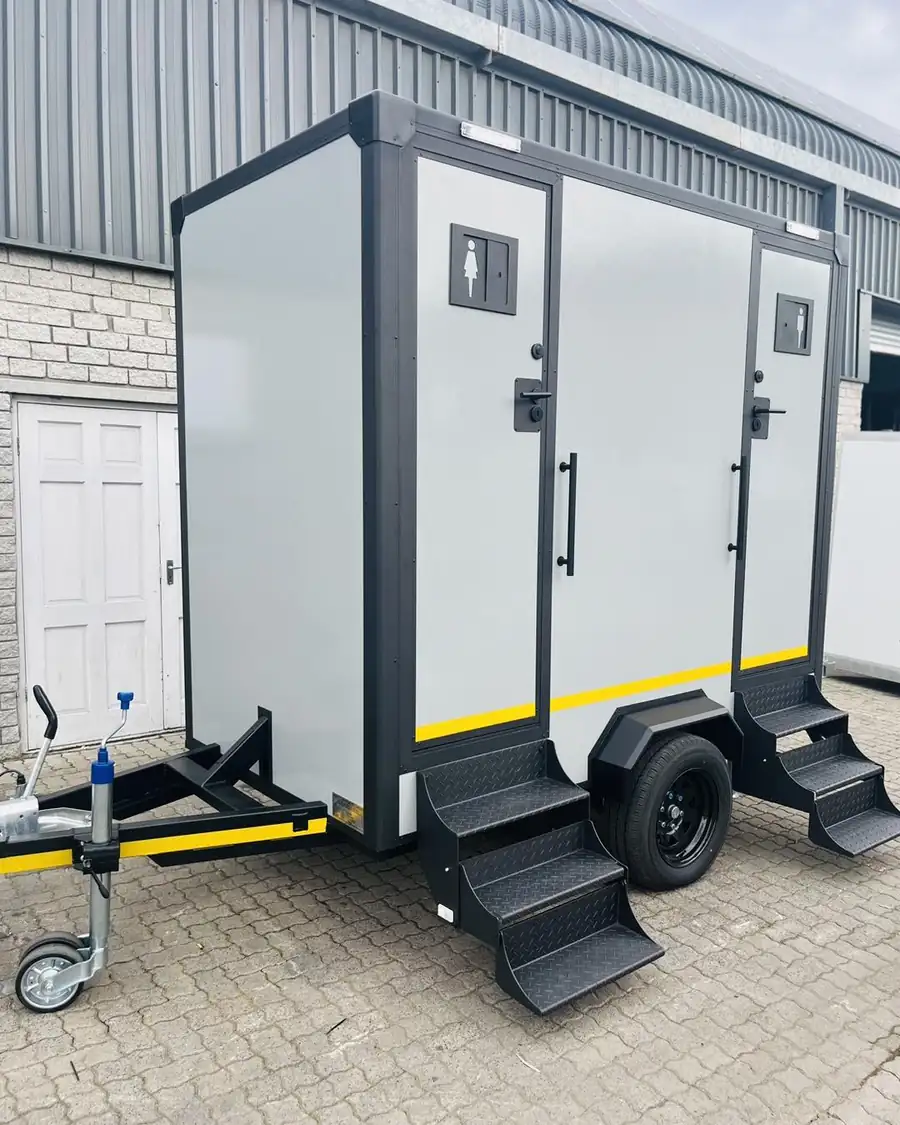 Restroom trailer with steps folded down